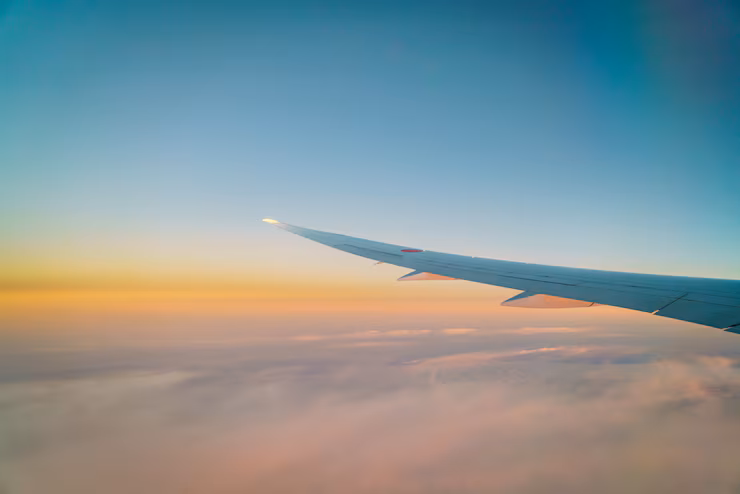 Airplane wing flying over the Pacific on a Sacramento to Hawaii flight